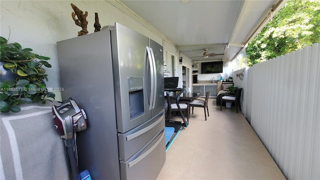 view of patio / terrace featuring ceiling fan