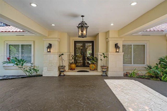 entrance to property featuring french doors