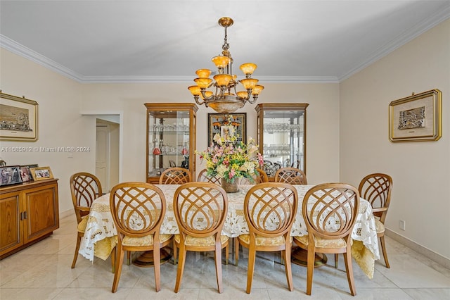 dining area featuring crown molding, baseboards, an inviting chandelier, and light tile patterned floors