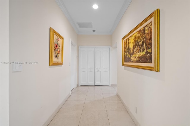 hallway featuring baseboards, ornamental molding, light tile patterned flooring, and recessed lighting