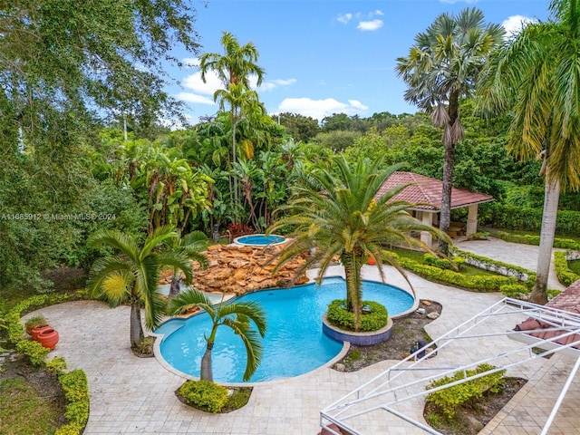 pool featuring a patio area