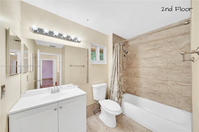 full bathroom with toilet, shower / bath combination with curtain, vanity, and tile patterned flooring