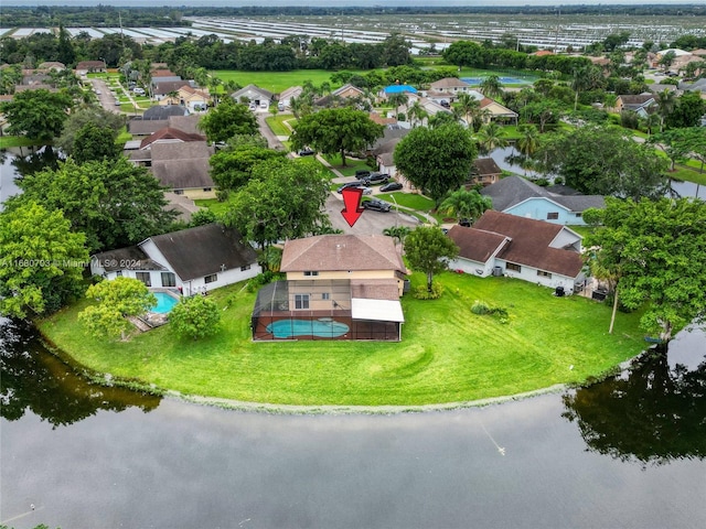 drone / aerial view with a water view