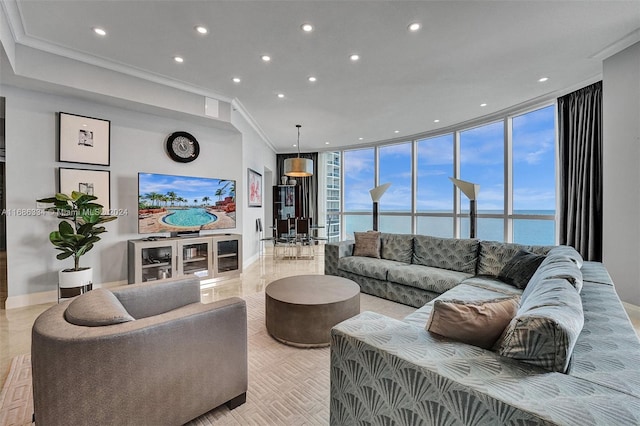 living room featuring ornamental molding, a wealth of natural light, and expansive windows