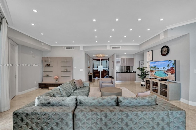 living room featuring crown molding