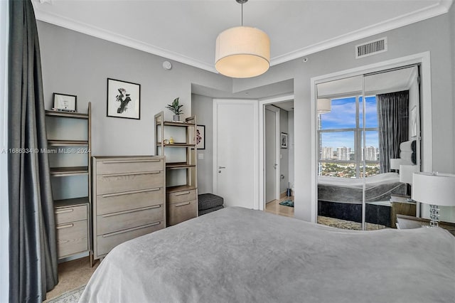 carpeted bedroom featuring ornamental molding