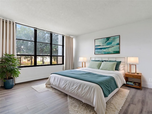 bedroom featuring hardwood / wood-style flooring