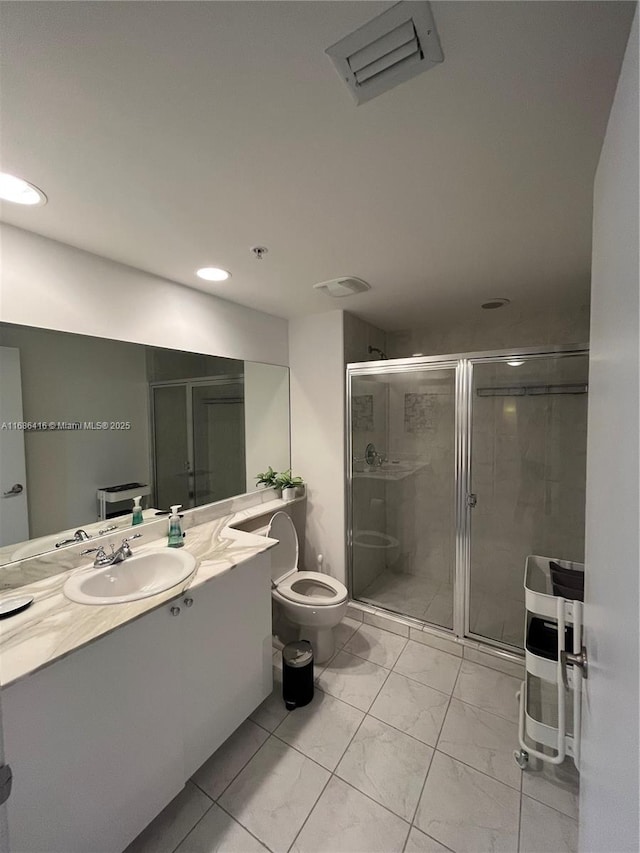 full bath featuring marble finish floor, visible vents, toilet, a stall shower, and vanity