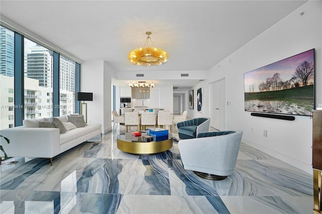 living room with an inviting chandelier