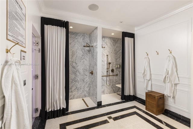 bathroom featuring tiled shower and crown molding