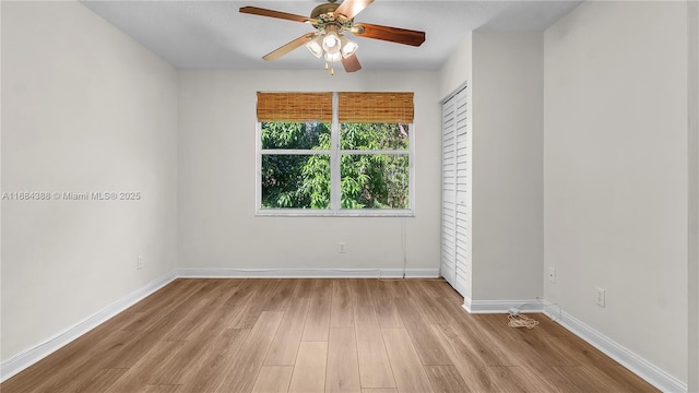 4795 S Classical Blvd, Delray Beach, FL 33445 - empty room featuring baseboards, wood finished floors, and a ceiling fan