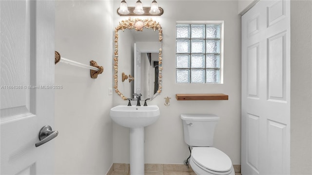 4795 S Classical Blvd, Delray Beach, FL 33445 - half bath with tile patterned floors and toilet