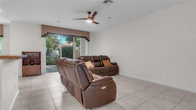 4795 S Classical Blvd, Delray Beach, FL 33445 - living area featuring light tile patterned floors, ceiling fan, baseboards, and visible vents
