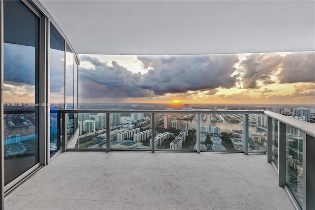 view of balcony at dusk