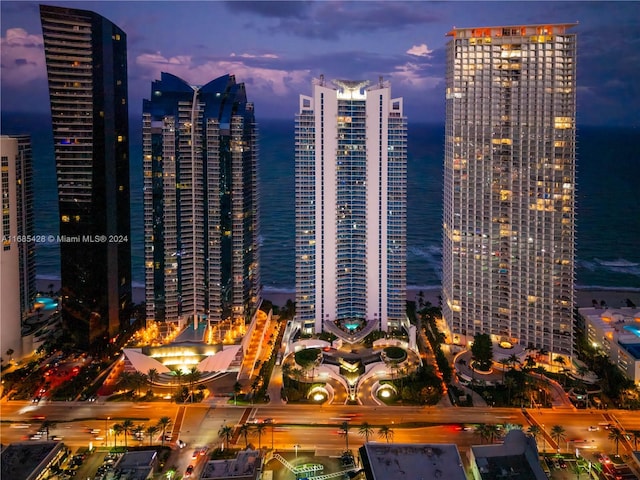 property's view of city with a water view