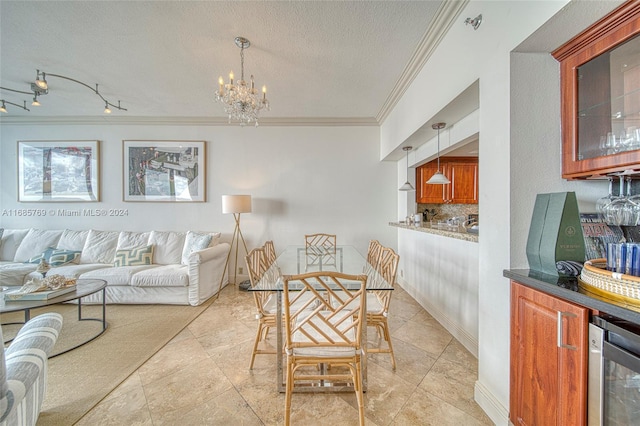 tiled living room featuring wine cooler, a notable chandelier, a textured ceiling, and ornamental molding