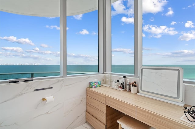 bathroom with a water view