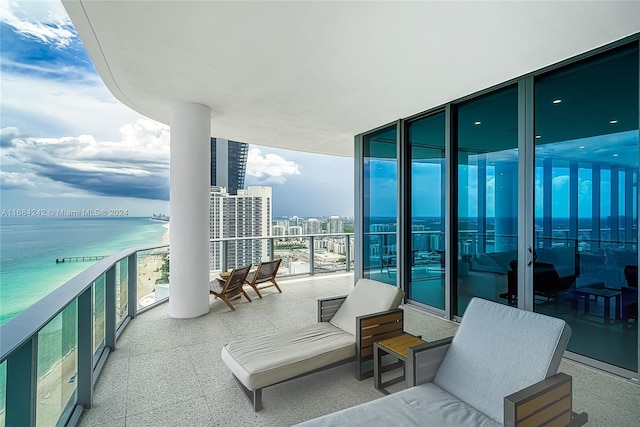 balcony featuring a water view