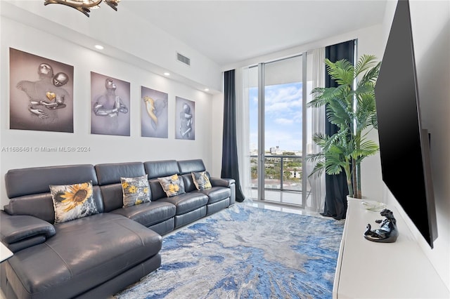 living room with floor to ceiling windows