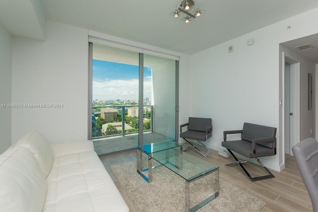 1600 SW 1st Ave Unit 1104, Miami, FL 33129 - living room with floor to ceiling windows and wood finished floors