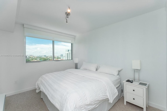 1600 SW 1st Ave Unit 1104, Miami, FL 33129 - bedroom featuring light carpet and baseboards