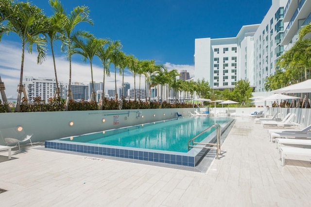 view of pool featuring a patio area