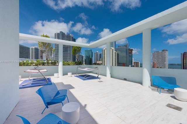 1600 SW 1st Ave Unit 1104, Miami, FL 33129 - view of patio / terrace featuring a view of skyline