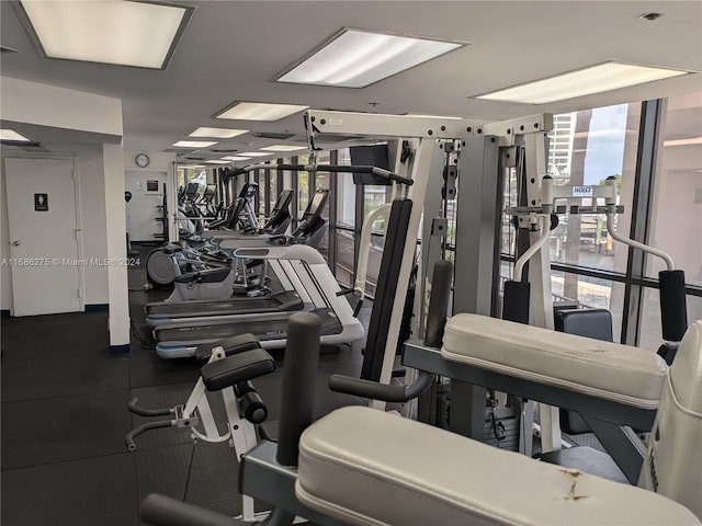 gym featuring floor to ceiling windows