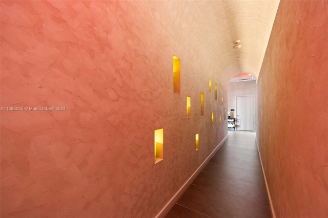 hallway featuring tile patterned flooring