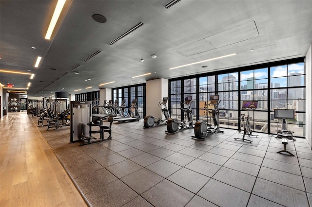 workout area with floor to ceiling windows