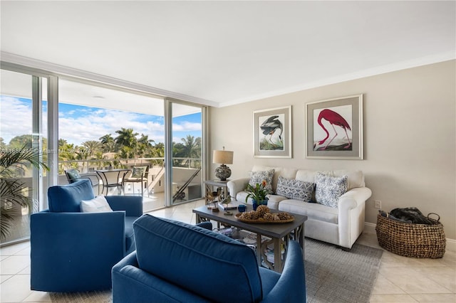 tiled living room featuring ornamental molding and plenty of natural light