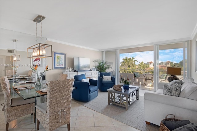 180 Isle Of Venice Dr Unit 432, Fort Lauderdale, FL 33301 - living room with healthy amount of natural light, light tile patterned floors, crown molding, expansive windows, and a chandelier