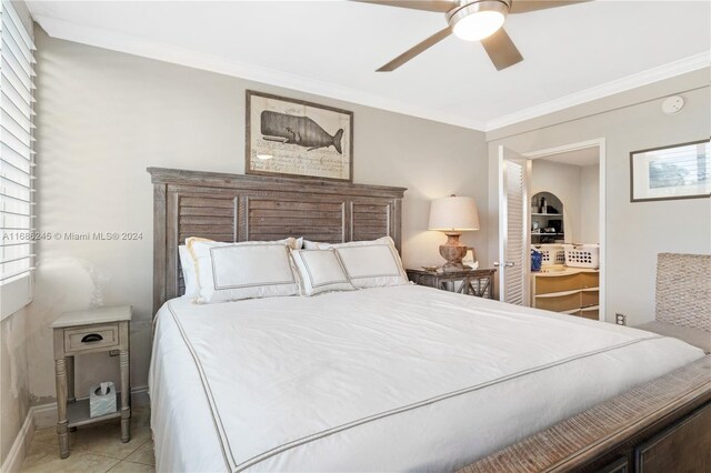 180 Isle Of Venice Dr Unit 432, Fort Lauderdale, FL 33301 - bedroom featuring ornamental molding, baseboards, ceiling fan, and light tile patterned flooring