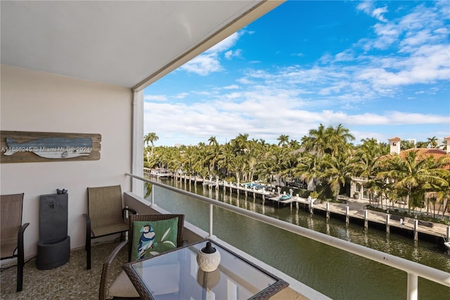 balcony featuring a water view