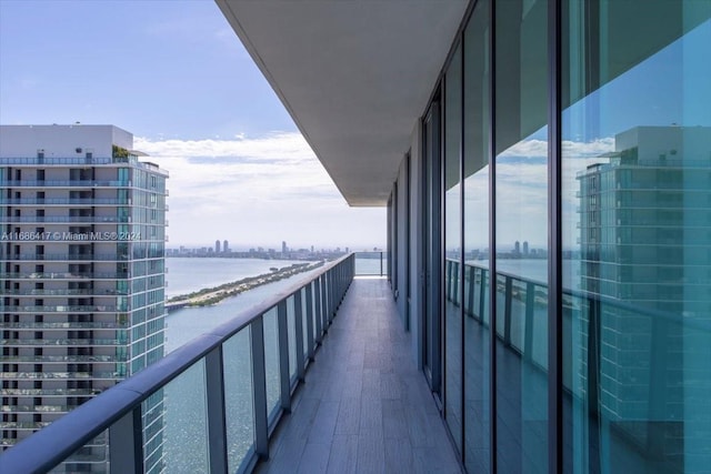 balcony featuring a water view