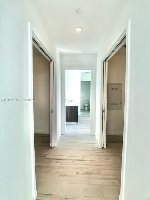 hallway featuring light hardwood / wood-style floors