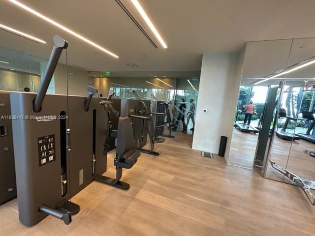 workout area featuring light hardwood / wood-style flooring