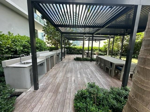 wooden deck featuring a pergola