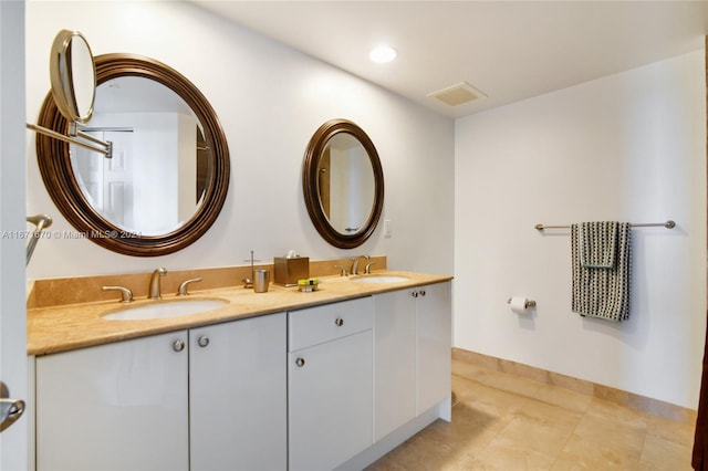 bathroom featuring vanity and tile patterned floors