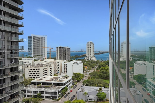 property's view of city featuring a water view