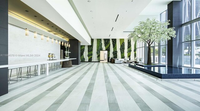 851 NE 1st Ave Unit 3302, Miami, FL 33132 - community lobby featuring a high ceiling
