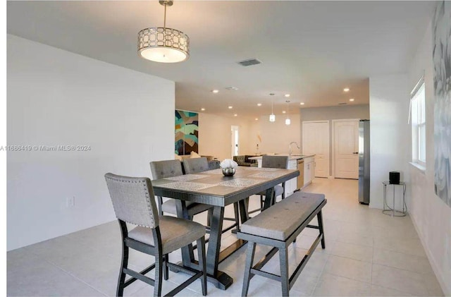 2613 SW Harem Cir, Port St Lucie, FL 34953 - dining room with recessed lighting and light tile patterned flooring