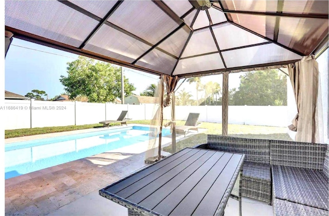 2613 SW Harem Cir, Port St Lucie, FL 34953 - view of pool featuring a fenced backyard, a patio, and a gazebo