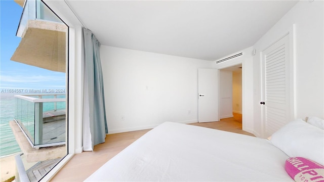 bedroom featuring light hardwood / wood-style flooring