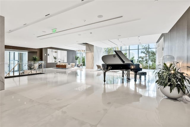 misc room with floor to ceiling windows and a wealth of natural light