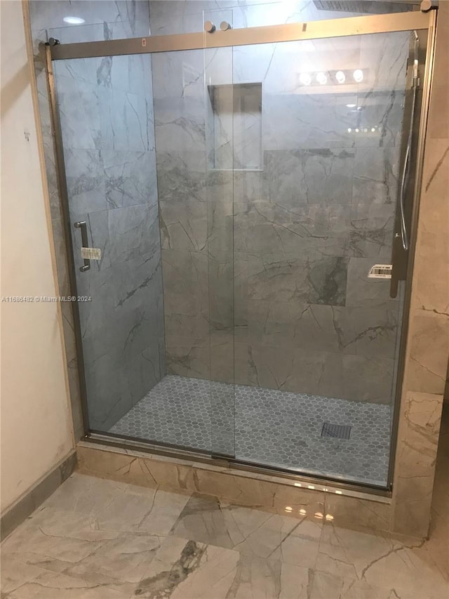 bathroom featuring walk in shower