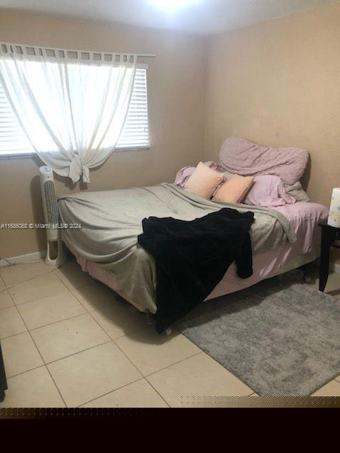 view of tiled bedroom