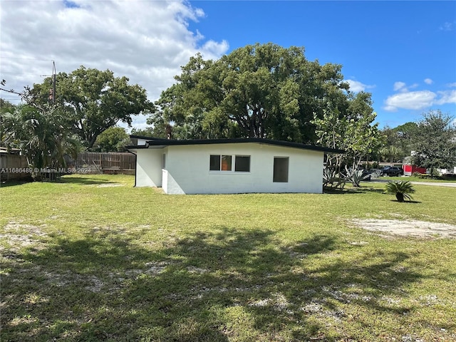 2128 Sycamore Dr, Winter Park, FL 32789 - view of side of property featuring stucco siding