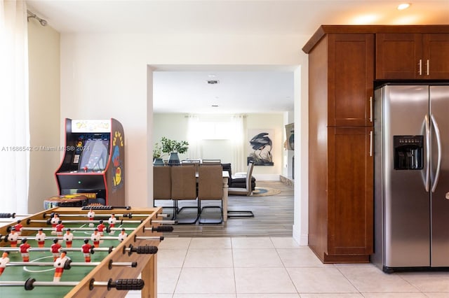 game room featuring light wood-type flooring