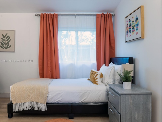 bedroom with light hardwood / wood-style floors